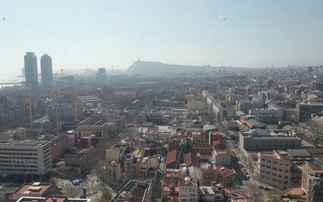 AERIAL: Barcelona Wide Drone of Hazy Cityscape