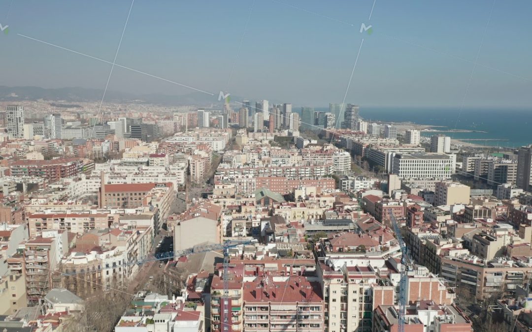 AERIAL: Barcelona Wide Drone Shot of City Towards Skyline Cityscape