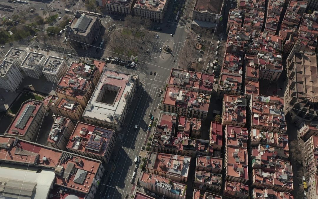 AERIAL: Barcelona Overhead Drone Shot of Typical City Blocks in Beautiful Sunlight with Urban