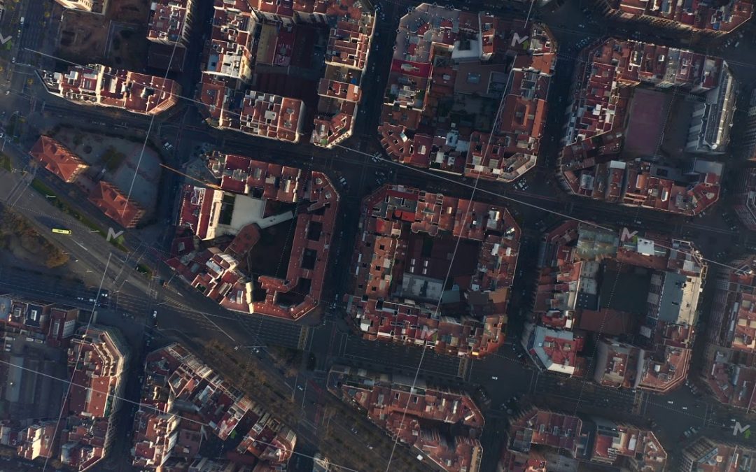 AERIAL: Overhead Drone Shot of Typical City Blocks in Barcelona, Spain in beautiful Sunlight